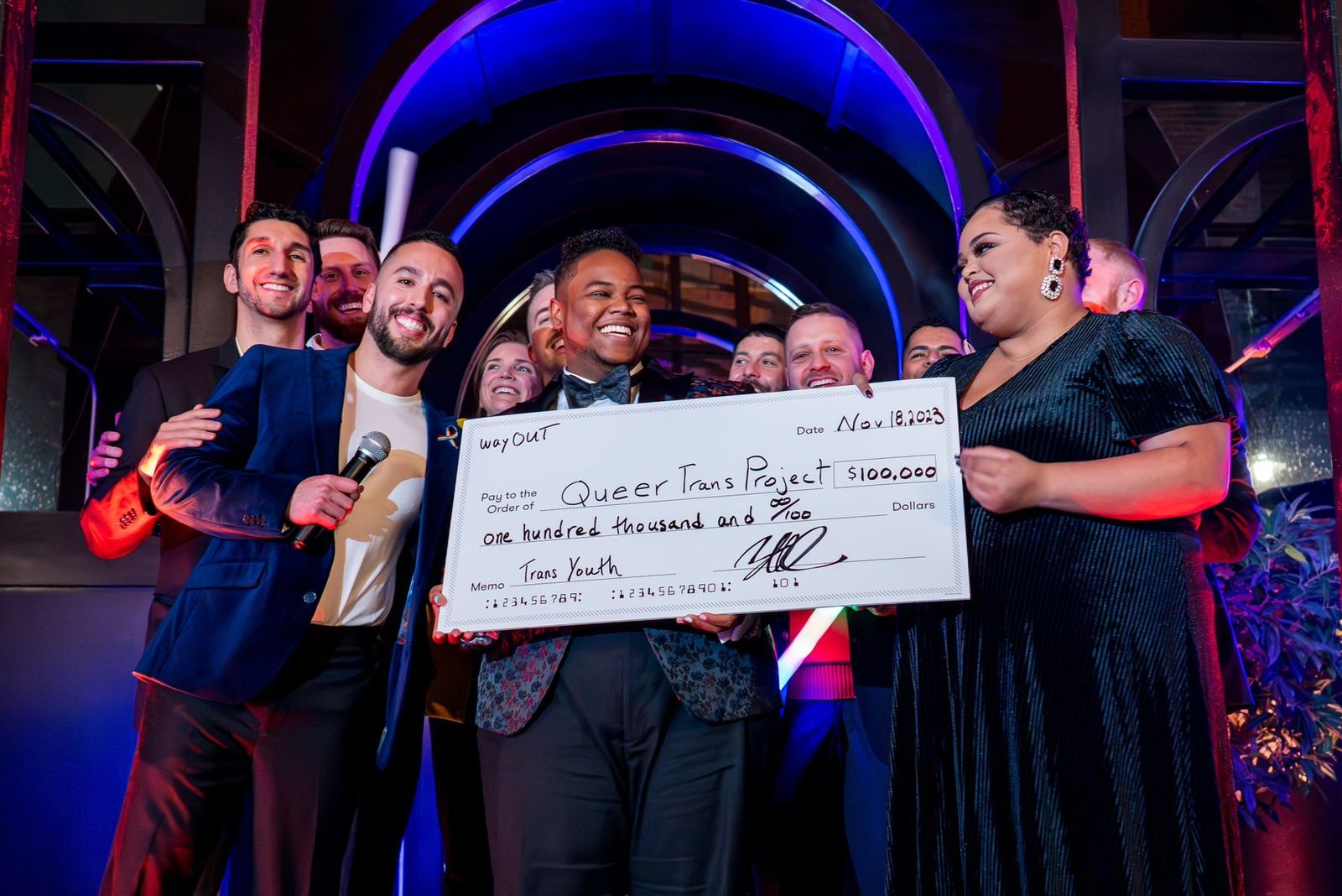 The Seattle chapter on stage with a big check at the 2023 Seattle Gayla