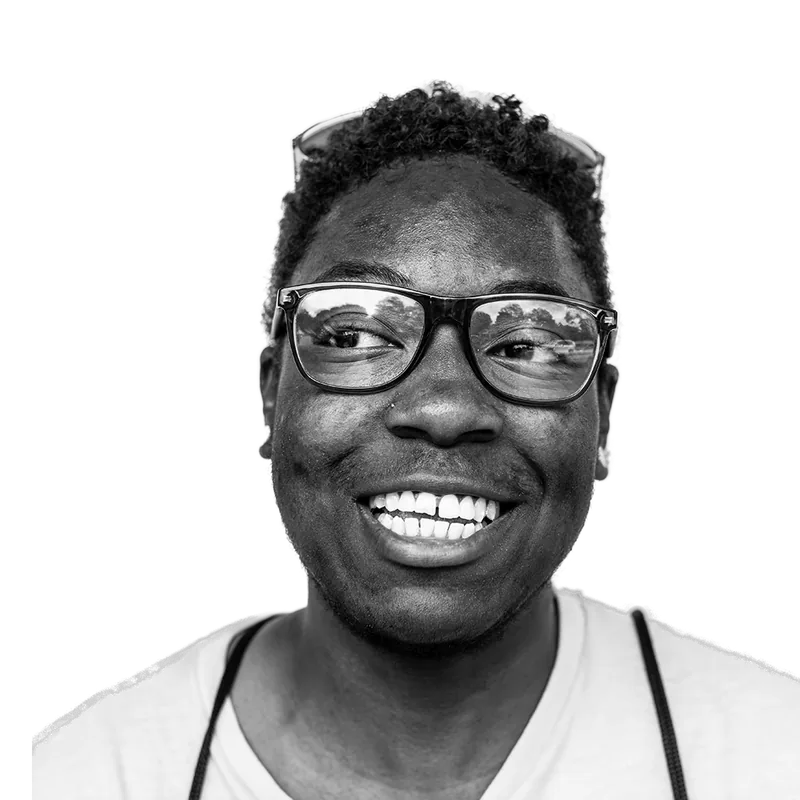 Smiling youth from OUTMemphis in glasses